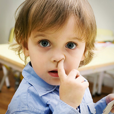 child picking nose